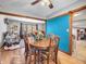 Bright dining room with light wood floors, a round table with chairs, and an open layout at 6347 St Joe Dr, Indianapolis, IN 46217