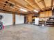 The garage interior is clean and spacious, with wooden shelving and plenty of room for storage at 6347 St Joe Dr, Indianapolis, IN 46217