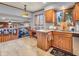 A kitchen showing wooden cabinets and countertops as well as a view to the living room below at 6347 St Joe Dr, Indianapolis, IN 46217
