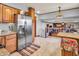 Spacious kitchen featuring stainless steel appliances and opening up to another room at 6347 St Joe Dr, Indianapolis, IN 46217