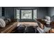 Charming living room features a bay window, parquet floors, and a cozy leather sofa at 650 Forest Blvd, Indianapolis, IN 46240