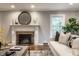 Elegant living room showcases a fireplace, modern decor, and ample seating at 650 Forest Blvd, Indianapolis, IN 46240