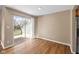 Dining area with hardwood floors and access to a private deck through sliding glass doors, creating an inviting space at 652 Blossom Dr, Avon, IN 46123