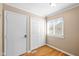 Hallway featuring a closet, entry door, and a bright window, offering functional space and natural light at 652 Blossom Dr, Avon, IN 46123