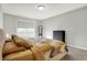 Bedroom with large window, neutral walls, plush carpet, a full-length mirror and a side dresser at 7111 Lillian Pl, Cumberland, IN 46229