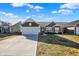 Charming single-story home with a two-car garage, neat landscaping, and a welcoming facade at 7111 Lillian Pl, Cumberland, IN 46229
