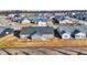 A well-maintained home features brown siding and a pristine lawn at 7111 Lillian Pl, Cumberland, IN 46229