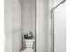 Bathroom with a toilet and tiled shower at 7138 Avalon Trail Ct, Indianapolis, IN 46250