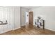 Bedroom with closet, hardwood floors, and a plant in the corner at 7138 Avalon Trail Ct, Indianapolis, IN 46250