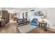 Open-concept living space with a kitchen and comfortable seating, creating a seamless flow at 7138 Avalon Trail Ct, Indianapolis, IN 46250