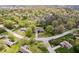 A beautiful aerial view of a single-Gathering home nestled among mature trees and well-maintained lawns in a residential neighborhood at 7263 Hidden Valley Dr, Plainfield, IN 46168