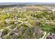 Panoramic aerial view featuring the expansive residential neighborhood and the surrounding natural landscape at 7263 Hidden Valley Dr, Plainfield, IN 46168