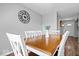 Dining room features hard wood floors, a view to the front door, and seating for four at 7263 Hidden Valley Dr, Plainfield, IN 46168