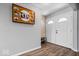 View of the front door with a double door entrance next to a decorative wooden wall at 7263 Hidden Valley Dr, Plainfield, IN 46168