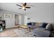 Spacious living room with an open layout, offering flexible space and comfortable modern furniture at 7263 Hidden Valley Dr, Plainfield, IN 46168