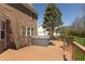 A spacious back deck features a hot tub with steps for easy access, perfect for relaxing and entertaining outdoors at 8259 Plumwood Ln, Indianapolis, IN 46256
