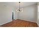 Bright and airy dining room with hardwood floors and plenty of natural light at 8259 Plumwood Ln, Indianapolis, IN 46256
