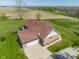Aerial view showcasing the home, garage, and driveway at 8654 N Baltimore Rd, Monrovia, IN 46157