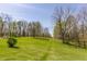 Well-manicured backyard with a gentle slope at 8654 N Baltimore Rd, Monrovia, IN 46157