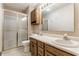Bright bathroom features a double vanity, shower, and ample storage space at 8654 N Baltimore Rd, Monrovia, IN 46157