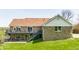 Exterior view of the back of the house featuring a deck and staircase at 8654 N Baltimore Rd, Monrovia, IN 46157