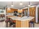 Spacious kitchen with wooden cabinets, stainless steel appliances, and a central island for casual dining at 8654 N Baltimore Rd, Monrovia, IN 46157
