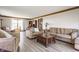 Large living room with modern flooring, neutral color palette, and wood trim at 8654 N Baltimore Rd, Monrovia, IN 46157