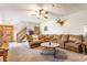 Inviting living room with a staircase and a large comfortable sectional at 8654 N Baltimore Rd, Monrovia, IN 46157