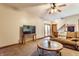 Bright living room area with a tv and doors to the outside at 8654 N Baltimore Rd, Monrovia, IN 46157