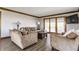 Cozy living room with comfortable seating and a sliding glass door to the outside at 8654 N Baltimore Rd, Monrovia, IN 46157