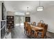 Spacious dining room with a view of the backyard through sliding glass doors at 9242 Golden Leaf Way, Indianapolis, IN 46260