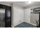 Hallway featuring closet space and a refrigerator, offering convenient storage solutions at 9242 Golden Leaf Way, Indianapolis, IN 46260