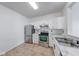 Bright kitchen featuring white cabinets, stainless steel appliances, and updated countertops at 1045 Evening Shade Cir, Beech Grove, IN 46107