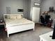 Comfortable bedroom with a large bed, ample storage, and a cozy ambiance at 109 S County Line Rd, , IN 47272