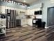 Modern kitchen with stainless steel appliances, sleek cabinets, and stylish flooring at 109 S County Line Rd, , IN 47272