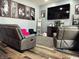 Relaxing living room with plush furniture, a large TV, and ample natural light at 109 S County Line Rd, , IN 47272