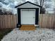 A backyard shed offers extra storage space and has a convenient ramp entrance at 109 S County Line Rd, , IN 47272