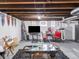 Finished basement with seating and television at 1237 E Pleasant Run Pkwy S Dr, Indianapolis, IN 46203