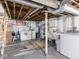 Unfinished basement with laundry and utility area at 1237 E Pleasant Run Pkwy S Dr, Indianapolis, IN 46203