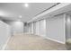 Finished basement with storage and carpeted flooring at 1310 N Chester Ave, Indianapolis, IN 46201