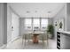 Cozy dining area with stylish furniture and natural light from the windows at 1310 N Chester Ave, Indianapolis, IN 46201
