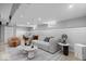 Comfortable living room area, with plush seating, bright lighting and modern decor at 1310 N Chester Ave, Indianapolis, IN 46201