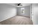 Comfortable bedroom with plush carpeting, bright window, and minimalist décor at 13211 N Landing W Cir, Camby, IN 46113