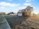 Charming two-story home with a well-kept lawn, driveway, and attached garage at 13211 N Landing W Cir, Camby, IN 46113