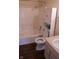 Bathroom featuring a combined shower and tub, modern toilet, storage cabinet, and sink at 143 Tracy Ridge Blvd, Whiteland, IN 46184