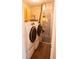 Functional laundry area with modern washer, dryer, cabinets and HVAC System at 143 Tracy Ridge Blvd, Whiteland, IN 46184
