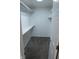 A practical walk-in closet providing ample storage with shelving and hanging rods at 143 Tracy Ridge Blvd, Whiteland, IN 46184