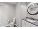 Bathroom featuring grey walls, granite countertop, white vanity and fixtures, and a shower/tub at 153 Terrace Ct, Franklin, IN 46131