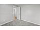 Bedroom featuring grey walls, neutral carpet, and an interior door at 153 Terrace Ct, Franklin, IN 46131