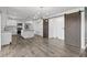 Open kitchen with stainless steel appliances, granite counters, and an eat-in island at 153 Terrace Ct, Franklin, IN 46131